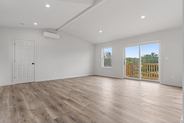 281 E Ave, Norwalk, CT 06850 - unfurnished room with a wall mounted air conditioner, light wood-style floors, and recessed lighting