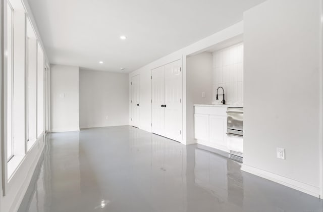 281 E Ave, Norwalk, CT 06850 - unfurnished room featuring recessed lighting and concrete flooring