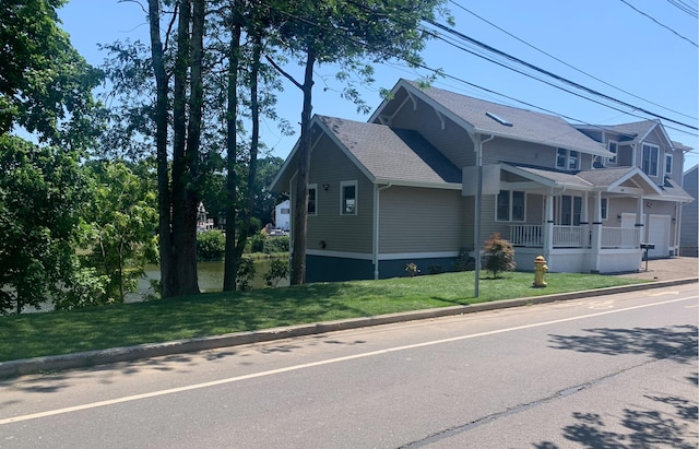 281 E Ave, Norwalk, CT 06850 - view of front facade featuring a front yard and covered porch