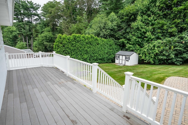 102 Herbert Dr, East Hartford, CT 06118 - wooden deck featuring a yard and a storage unit