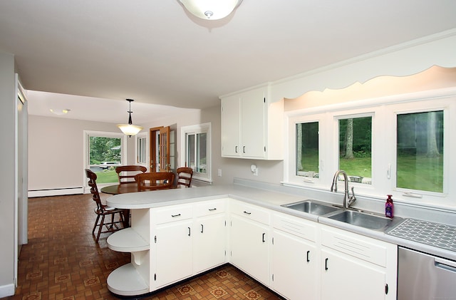 109 Pinnacle Rd, Ellington, CT 06029 - kitchen featuring a baseboard radiator, stainless steel dishwasher, white cabinets, light countertops, and a peninsula