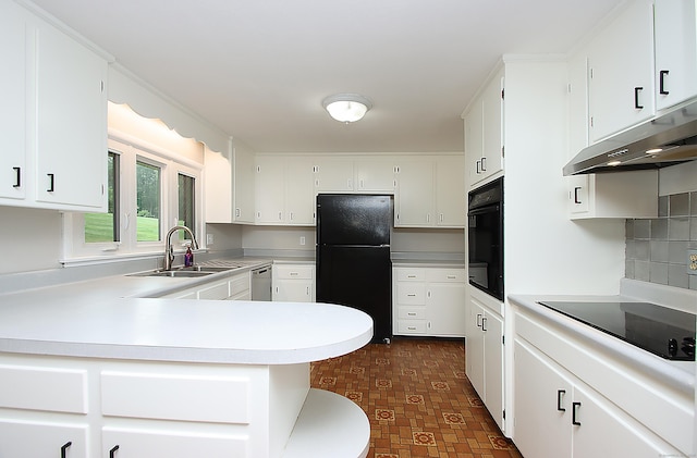 109 Pinnacle Rd, Ellington, CT 06029 - kitchen featuring black appliances, under cabinet range hood, light countertops, and white cabinetry