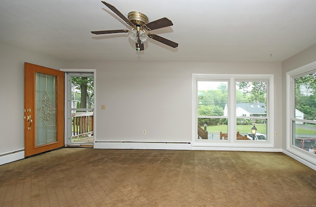 109 Pinnacle Rd, Ellington, CT 06029 - spare room featuring baseboard heating, a ceiling fan, and carpet