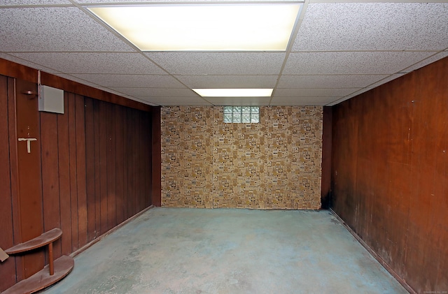 109 Pinnacle Rd, Ellington, CT 06029 - below grade area with wood walls and a paneled ceiling