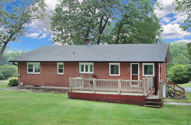 109 Pinnacle Rd, Ellington, CT 06029 - rear view of property with a lawn, a shingled roof, brick siding, and a deck