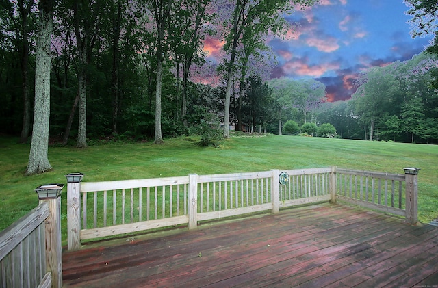 109 Pinnacle Rd, Ellington, CT 06029 - deck at dusk featuring a lawn