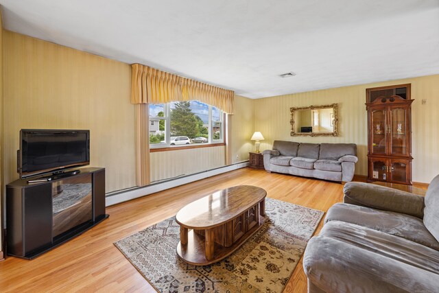 95 Flagg Ave, Watertown, CT 06779 - living area featuring baseboard heating and wood finished floors
