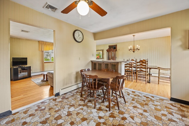 95 Flagg Ave, Watertown, CT 06779 - dining space featuring a baseboard radiator, ceiling fan, wallpapered walls, a chandelier, and wood finished floors