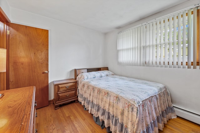 95 Flagg Ave, Watertown, CT 06779 - bedroom with baseboard heating and wood finished floors