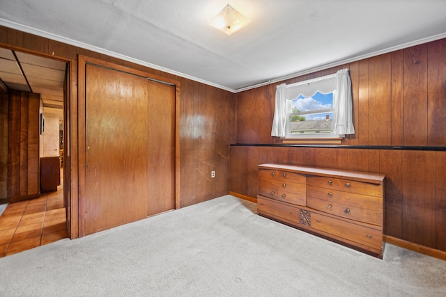 95 Flagg Ave, Watertown, CT 06779 - carpeted bedroom with a closet and wood walls