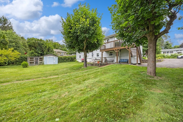 95 Flagg Ave, Watertown, CT 06779 - view of green lawn with a wooden deck, stairway, and a storage shed