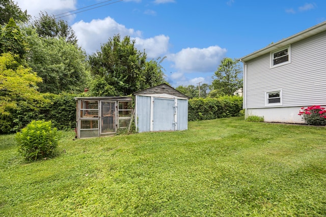 95 Flagg Ave, Watertown, CT 06779 - view of green lawn featuring a storage shed