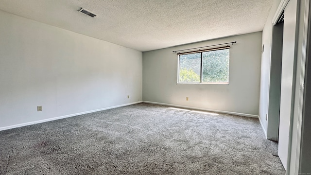 55 Thompson St Unit 17H, East Haven, CT 06513 - unfurnished room with carpet and a textured ceiling