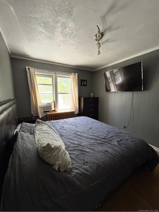 744 Canaan Rd Unit 23, Bridgeport, CT 06610 - bedroom with a textured ceiling, cooling unit, and ornamental molding