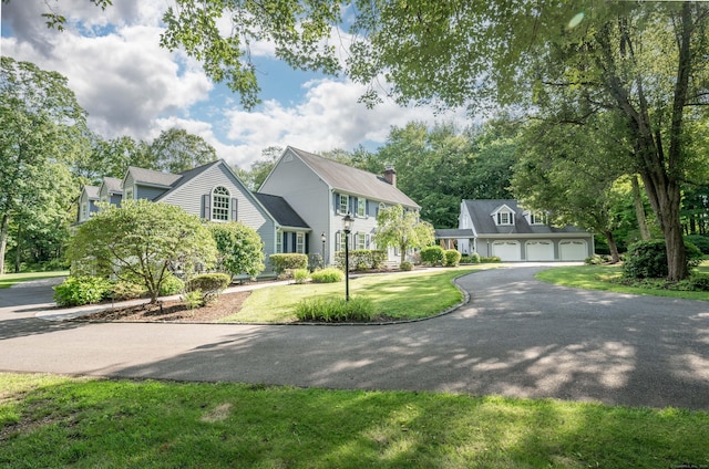 51 Wood Lot Ln, Southbury, CT 06488 - colonial-style house featuring asphalt driveway and a front lawn