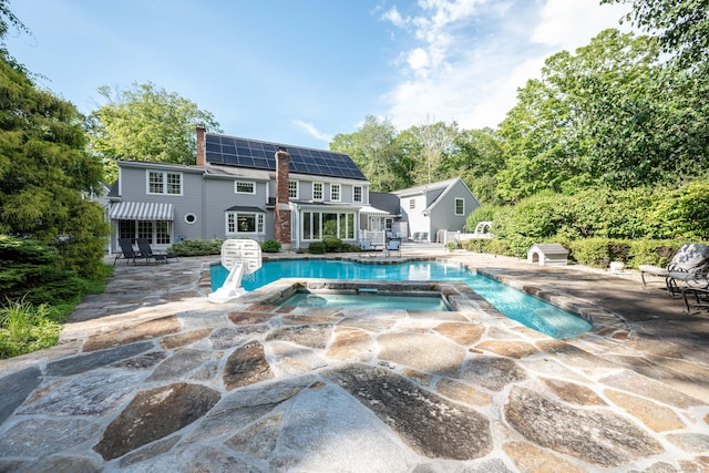 51 Wood Lot Ln, Southbury, CT 06488 - outdoor pool with an in-ground hot tub and a patio