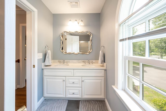 51 Wood Lot Ln, Southbury, CT 06488 - full bath with double vanity and baseboards