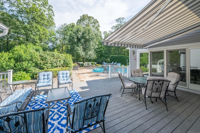 51 Wood Lot Ln, Southbury, CT 06488 - wooden deck with an outdoor pool and outdoor dining space