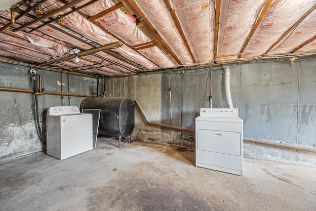 146 Williamson Cir, Watertown, CT 06779 - unfinished basement featuring oil tank and separate washer and dryer