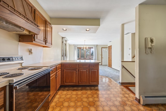 146 Williamson Cir, Watertown, CT 06779 - kitchen with electric stove, custom exhaust hood, a peninsula, a chandelier, and light countertops