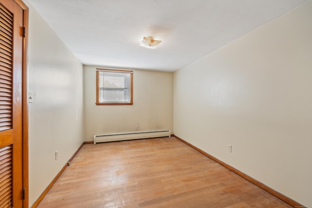 146 Williamson Cir, Watertown, CT 06779 - spare room featuring a baseboard radiator and light wood-style flooring