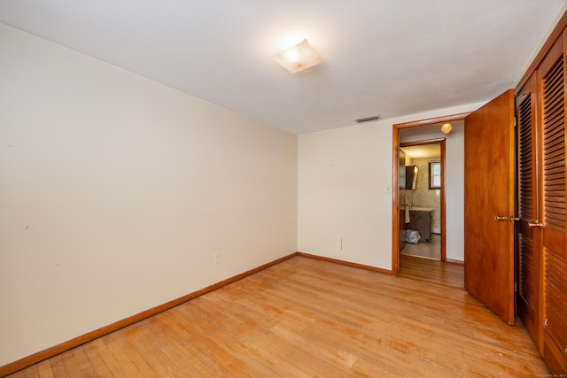 146 Williamson Cir, Watertown, CT 06779 - unfurnished bedroom featuring light wood-style flooring and a closet