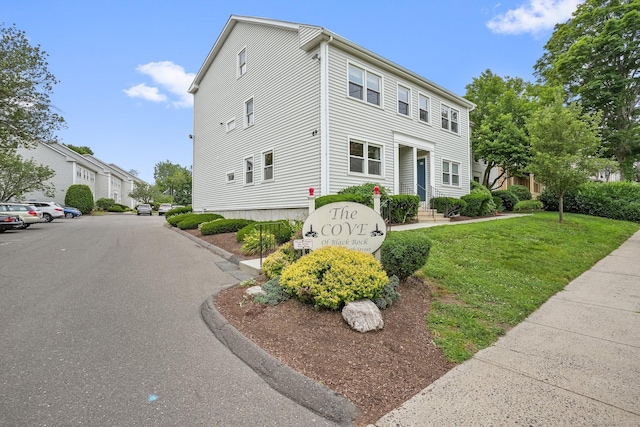 69 Ellsworth St Apt 101, Bridgeport, CT 06605 - view of front of property with a front yard