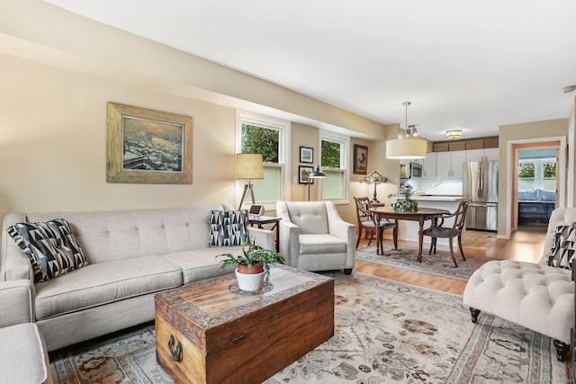 69 Ellsworth St Apt 101, Bridgeport, CT 06605 - living area featuring light wood-style flooring