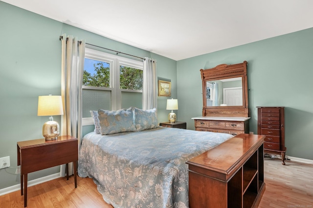 69 Ellsworth St Apt 101, Bridgeport, CT 06605 - bedroom featuring light wood finished floors and baseboards