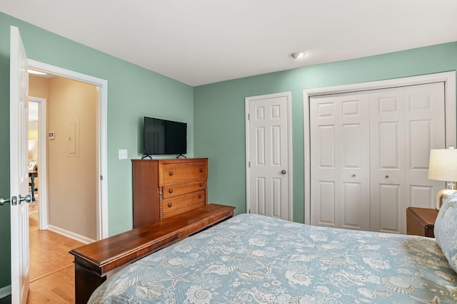 69 Ellsworth St Apt 101, Bridgeport, CT 06605 - bedroom with wood finished floors and baseboards