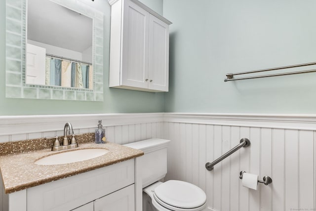 69 Ellsworth St Apt 101, Bridgeport, CT 06605 - bathroom with vanity and wainscoting