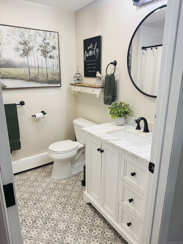 352 Knob Hill Dr, Hamden, CT 06518 - full bathroom with baseboard heating, vanity, and curtained shower