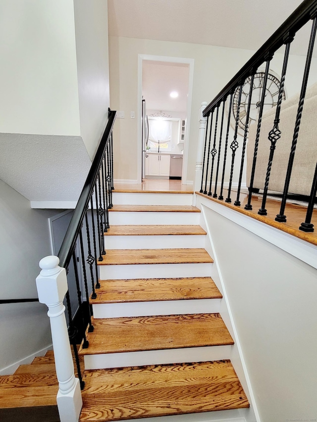 352 Knob Hill Dr, Hamden, CT 06518 - staircase featuring baseboards