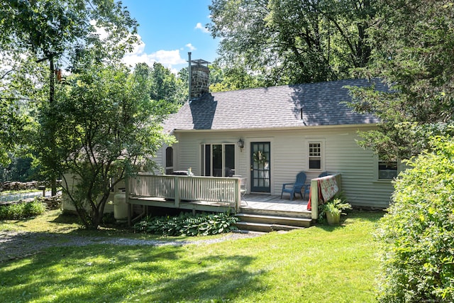 85 Potash Hill Rd, Sprague, CT 06330 - rear view of property with a yard, a wooden deck, a chimney, and roof with shingles