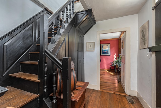 85 Potash Hill Rd, Sprague, CT 06330 - stairs featuring wood-type flooring and baseboards