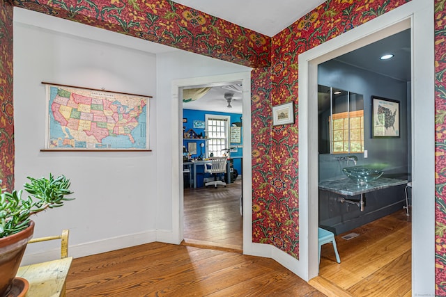 85 Potash Hill Rd, Sprague, CT 06330 - hallway with wood-type flooring, a desk, wallpapered walls, and recessed lighting