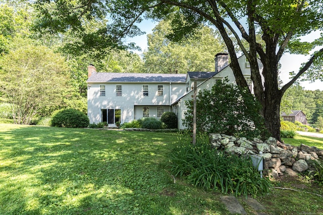 85 Potash Hill Rd, Sprague, CT 06330 - view of front of house with a chimney and a front yard