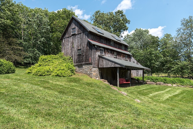 85 Potash Hill Rd, Sprague, CT 06330 - rear view of property featuring a barn, a lawn, and an outdoor structure
