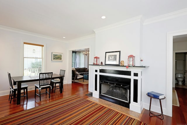 30 Elizabeth St, Bethel, CT 06801 - living room with ornamental molding, a chandelier, recessed lighting, wood finished floors, and a fireplace with flush hearth