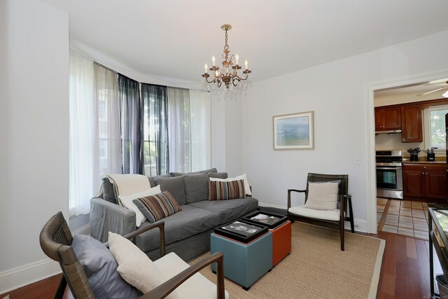 30 Elizabeth St, Bethel, CT 06801 - living room with a chandelier and light wood-style flooring