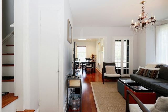 30 Elizabeth St, Bethel, CT 06801 - living room with dark wood-type flooring and a chandelier