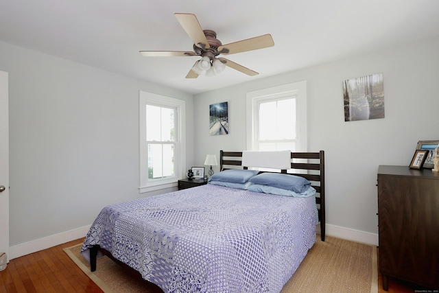 30 Elizabeth St, Bethel, CT 06801 - bedroom with multiple windows, ceiling fan, and wood finished floors