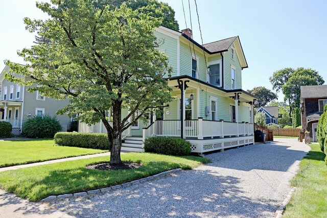 30 Elizabeth St, Bethel, CT 06801 - victorian-style house with a porch and a chimney