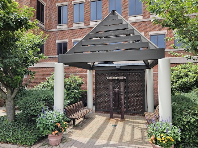 95 Audubon St Unit 339, New Haven, CT 06510 - doorway to property with brick siding and a pergola