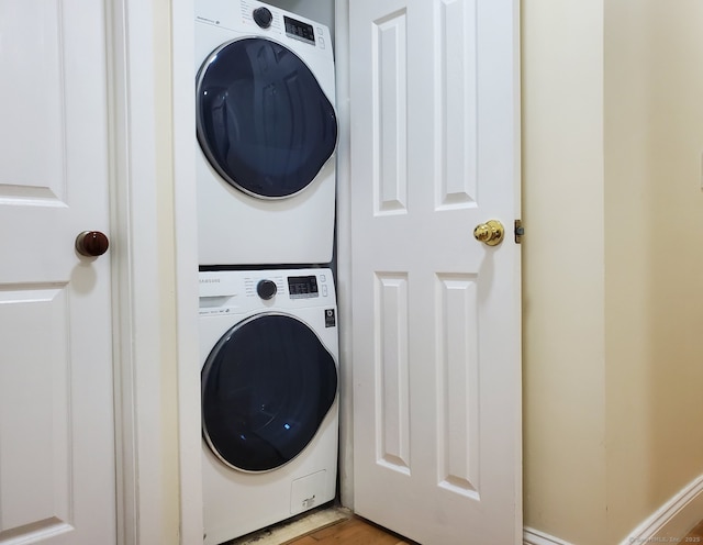 95 Audubon St Unit 339, New Haven, CT 06510 - washroom featuring estacked washer and dryer and light wood-style flooring