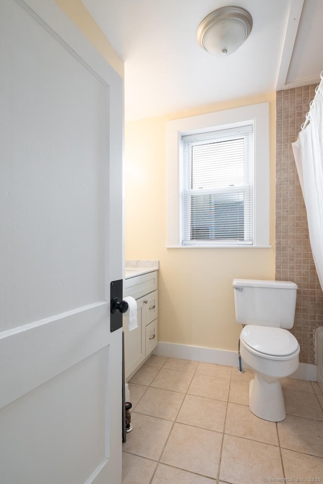 15 Magnolia Ave, Bristol, CT 06010 - full bathroom with vanity, tile patterned flooring, and a shower with curtain