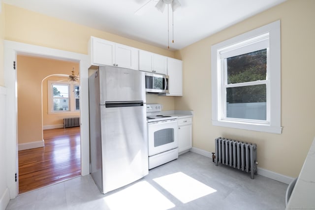 15 Magnolia Ave, Bristol, CT 06010 - kitchen featuring radiator heating unit, appliances with stainless steel finishes, and ceiling fan