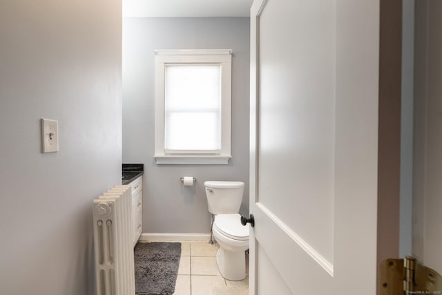 15 Magnolia Ave, Bristol, CT 06010 - half bath with radiator, tile patterned flooring, and vanity