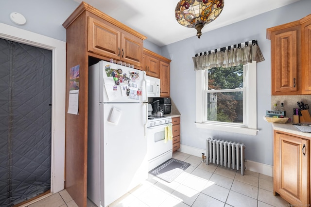 15 Magnolia Ave, Bristol, CT 06010 - kitchen with radiator, white appliances, light countertops, and light tile patterned flooring