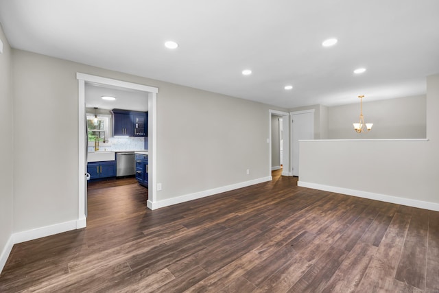 216 Old Monson Rd, Stafford, CT 06076 - empty room featuring dark wood-type flooring, a chandelier, and recessed lighting